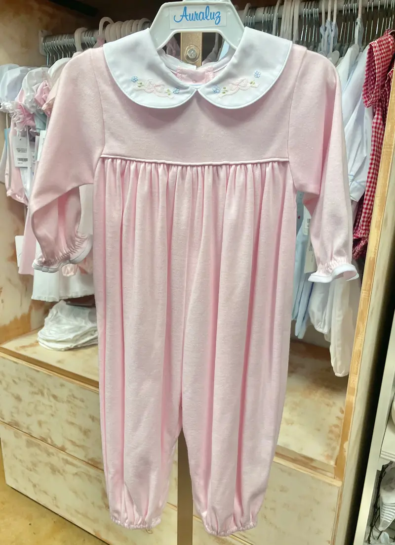 Pink Knit Romper Adorned With Bow Details 1