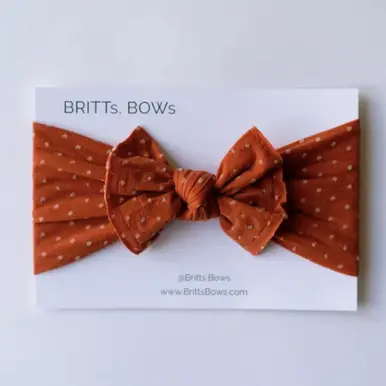 Pumpkin-Colored Headband With Honeycomb Dot Design 1