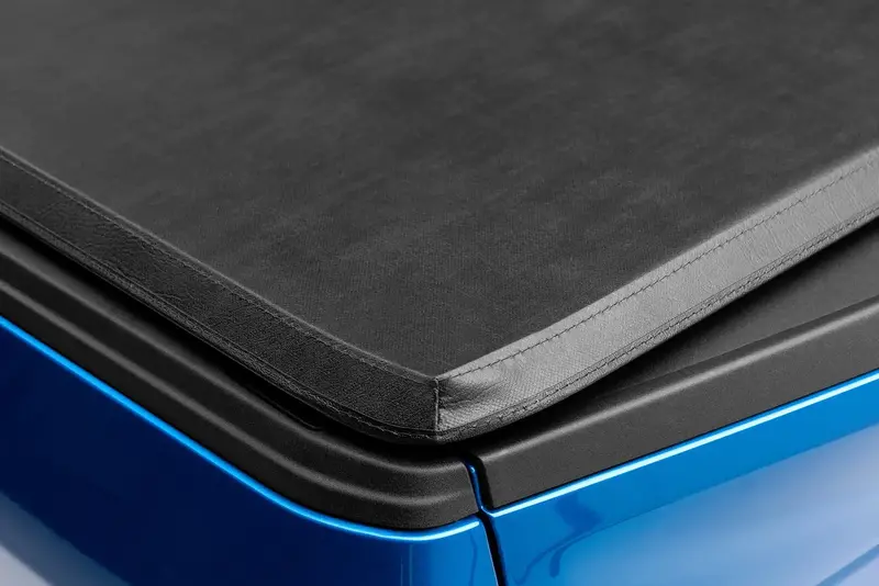 Lund Genesis Tri-Fold Tonneau Cover – Black Leather-Texture With Utili-Track System (Excludes Titan Box) 1